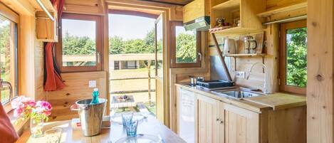Fridge, coffee/tea maker, dining tables