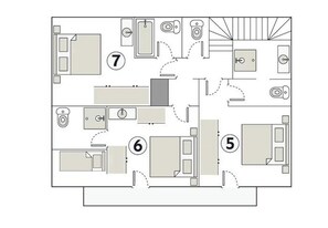 Plano de planta de un hotel con 7 habitaciones, un pasillo central y un baño.