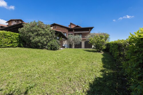 Bruno Selvago's Casba.  Rustic house with exposed brick surrounded by vineyards.