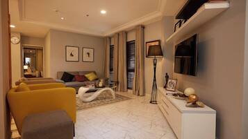 Familiekamer, balkon, uitzicht op de stad | Woonruimte