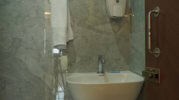 Shower, towels, soap, shampoo