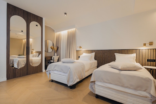 Superior Triple Room, Lanai, Courtyard View | In-room safe, desk, laptop workspace, soundproofing