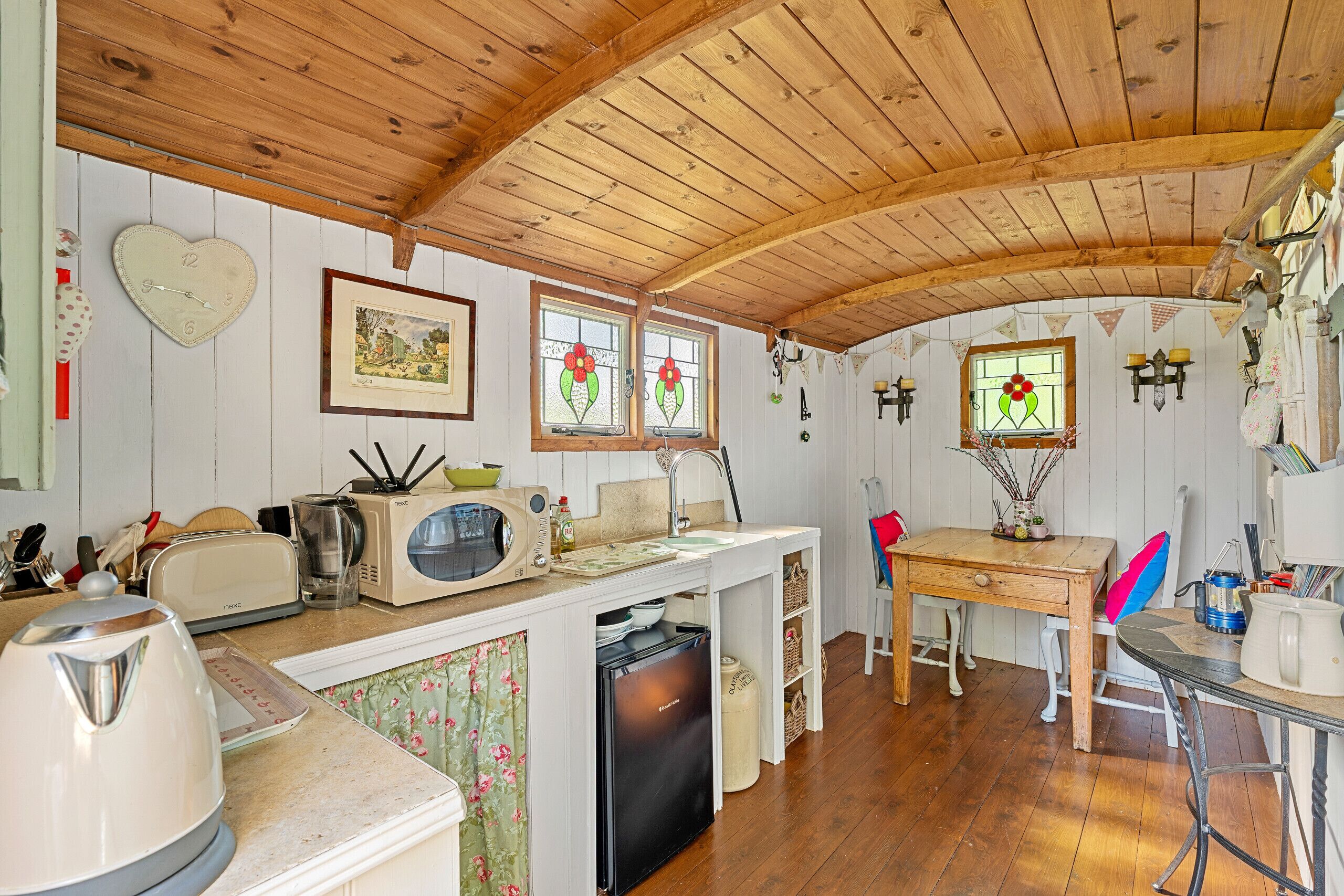 Fridge, microwave, electric kettle, cookware/dishes/utensils