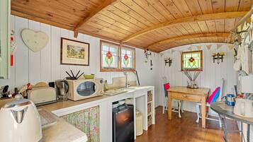 Fridge, microwave, electric kettle, cookware/dishes/utensils