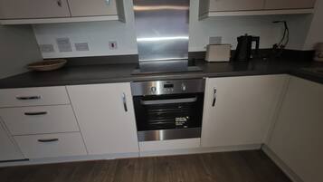 Apartment | Private kitchen | Fridge, microwave, oven, stovetop