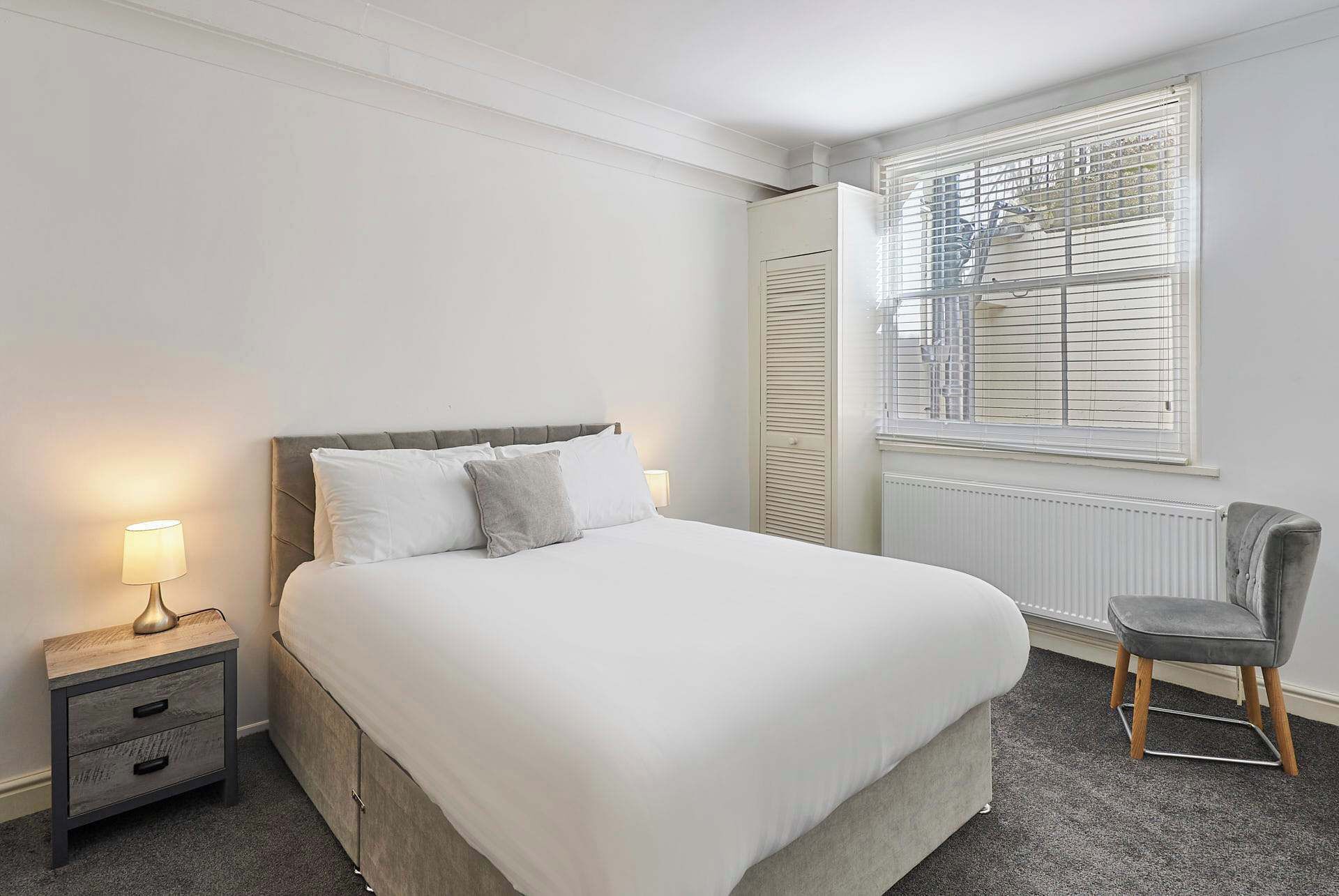 1 bedroom, desk, iron/ironing board, bed sheets