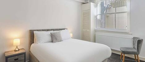1 bedroom, desk, iron/ironing board, bed sheets