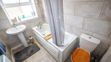 Hair dryer, towels, soap, shampoo