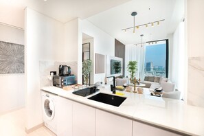 Apartment, 2 Bedrooms, Private Pool | Private kitchen - Easygo- Lux 2BR / Private Pool JVC Onyx (Dubai)