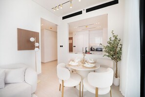 Apartment, 2 Bedrooms, Pool Access | Dining room - Easygo- Lux 2BR / Private Pool JVC Onyx (Dubai)