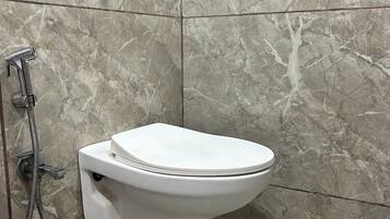 Hair dryer, towels, soap, toilet paper