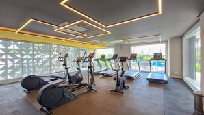 A gym with treadmills, stationary bikes, and elliptical machines. - Extension Berrini (Sao Paulo)