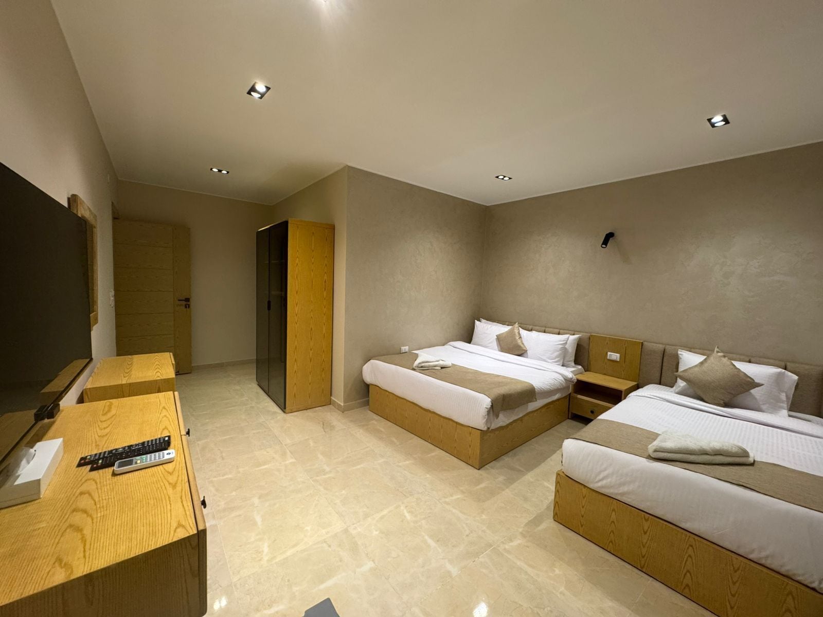 Deluxe Triple Room, Balcony, Pool View | Desk, soundproofing, free WiFi