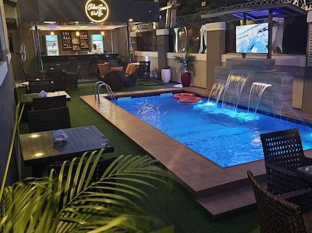 Outdoor pool. Carlton Swiss Luxury Residency