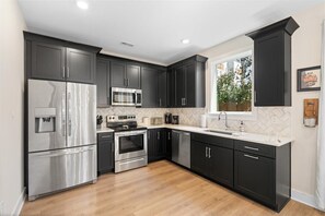 Fridge, microwave, oven, stovetop - The Nashville Nordic - Modern Vibes + Cozy Balcony (Nashville)