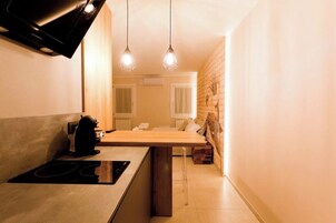 Superior Studio | Living area | TV