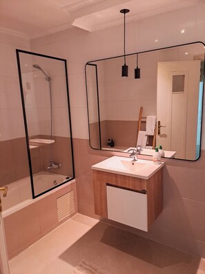 Hair dryer, towels, soap, toilet paper