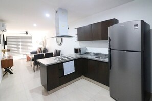 Fridge, microwave, stovetop, coffee/tea maker