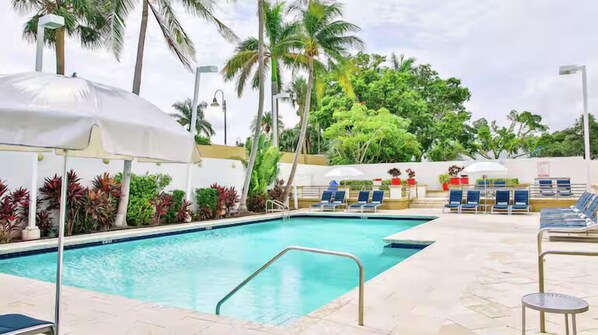 Outdoor pool, open 6:00 AM to 10:00 PM, pool cabanas (surcharge)