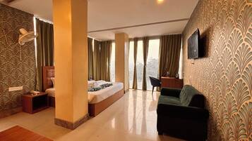 Deluxe Double Room, City View | Desk, laptop workspace, free WiFi