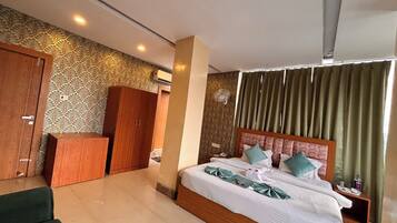 Deluxe Double Room, City View | Desk, laptop workspace, free WiFi