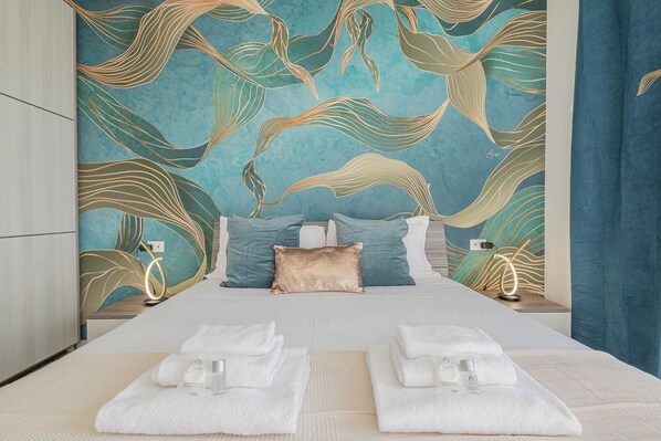 2 habitaciones, tabla de planchar con plancha, cuna de viaje y wifi