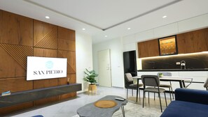 Welcome to SAN PIEDRO, where a warm atmosphere and comfortable seating area invite guests to relax and unwind.