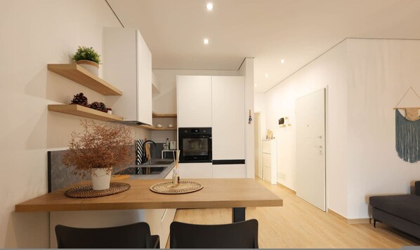 Private kitchen - SanPietro Vacation Apartment 010 (Plazhi San Pietro)