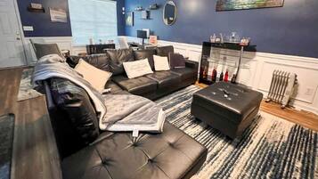 TV, fireplace, books