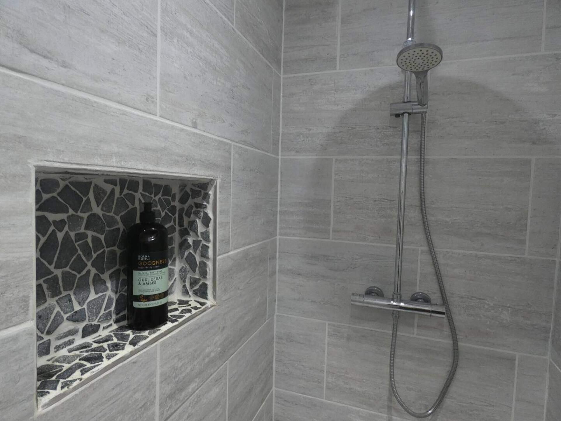 Shower, free toiletries, hair dryer, towels