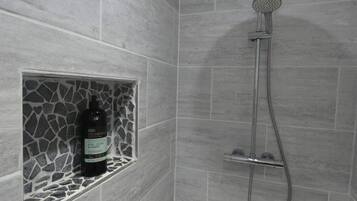 Shower, free toiletries, hair dryer, towels