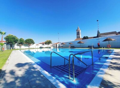 Halfway between Seville and Merida