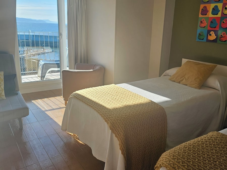 Premium bedding, down comforters, laptop workspace, WiFi (free)