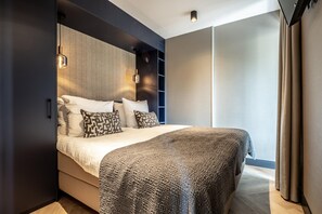 Apartamento | 2 dormitorios y tabla de planchar con plancha