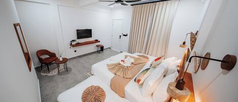 Family Double or Twin Room, Private Bathroom | In-room safe, desk, laptop workspace, blackout drapes