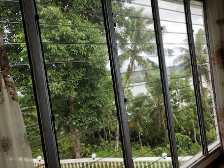 Desk, laptop workspace, blackout curtains, soundproofing. Suva Hideaway Villa