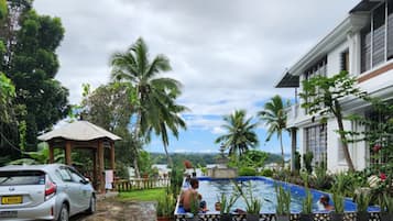 Outdoor pool, open 8:00 AM to 10:00 PM, free cabanas
