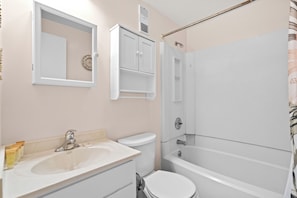 A bathroom with a sink, toilet, and bathtub. - Myrtle Beach Resort RT2111 (Myrtle Beach)