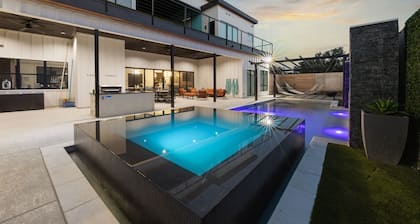 NEW Glam Luxury Home by River! Heated Pool•Hot Tub•Movie Room•Firepit Sleeps 24