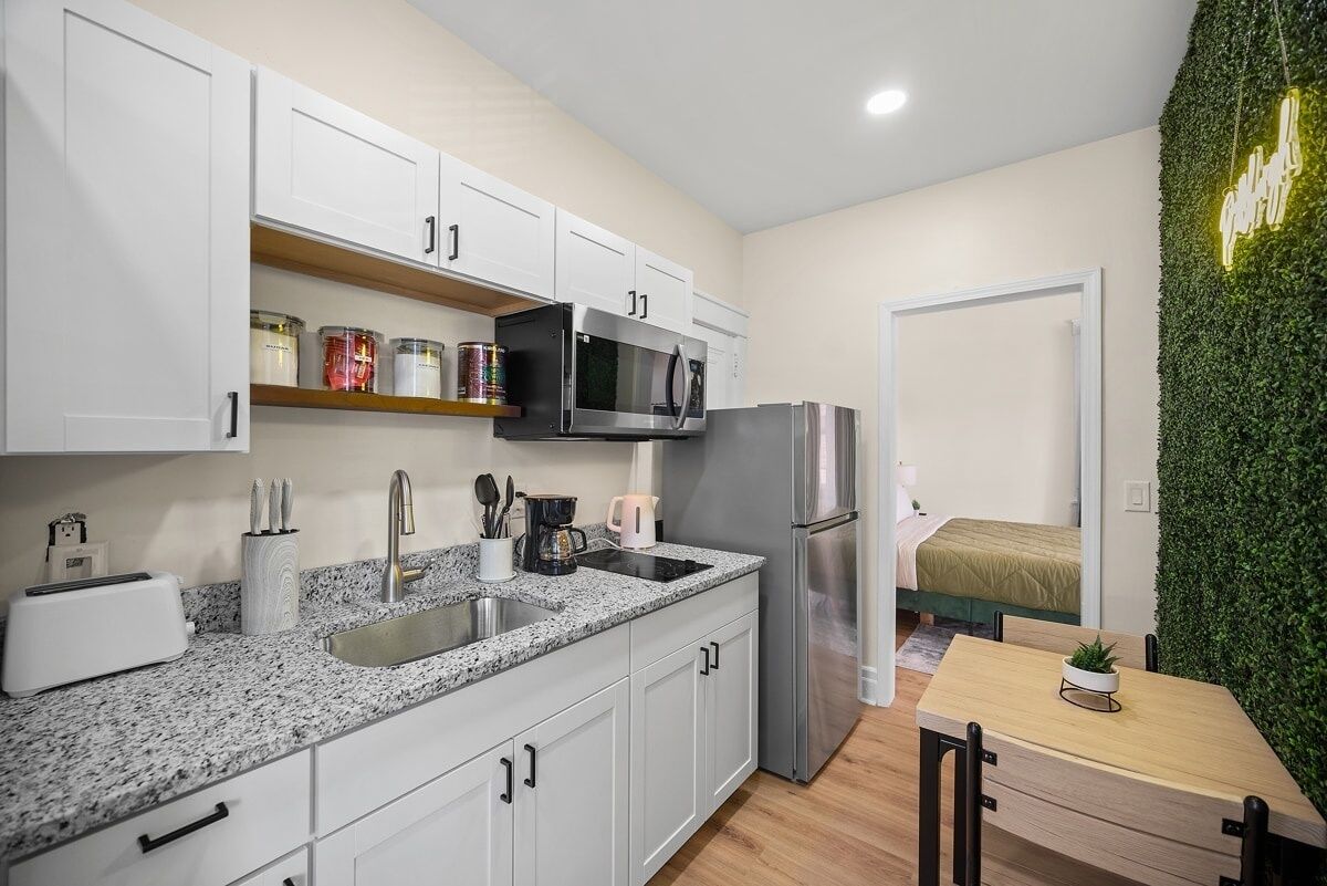 Fridge, microwave, stovetop, coffee/tea maker