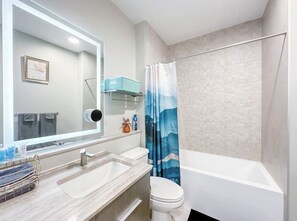 Hair dryer, towels, soap, toilet paper