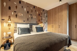 Apartamento | 2 dormitorios y tabla de planchar con plancha