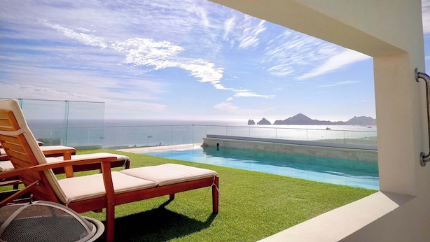 Unclassified image, 1 of 20, button - Arch View Master Bedroom Condo Cabo San Lucas • Rooftop Infinity Pool | 101 (Cabo San Lucas)