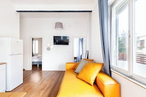 Appartement Deluxe, balcon | Aire de séjour