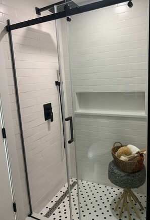 Shower, towels, soap, toilet paper