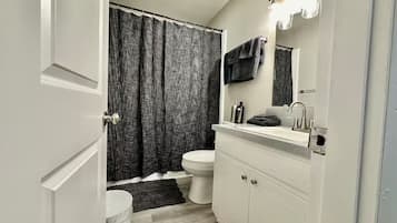 Hair dryer, towels, soap, shampoo