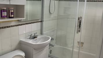 Hair dryer, towels, soap, shampoo