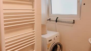 Hair dryer, towels, soap, toilet paper