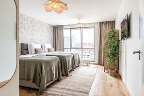 Departamento | 2 habitaciones y tabla de planchar con plancha 