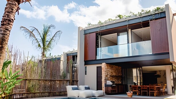 A modern two-story house with a glass balcony, a swimming pool, and outdoor furniture. - Casa Alma - By Living Milagres (Passo de Camaragibe)